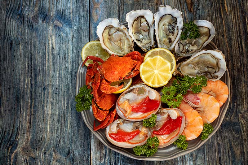 các thực phẩm giàu kẽm như tôm hàu